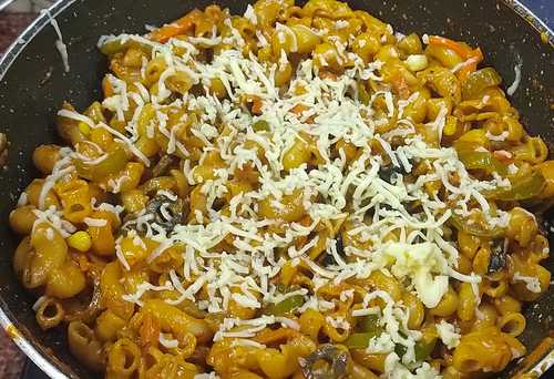 Put pasta in it and mix very well gently. Add 2 tablespoon of water and cook for 3-4 minutes