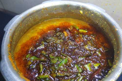 adding tadka to sambar